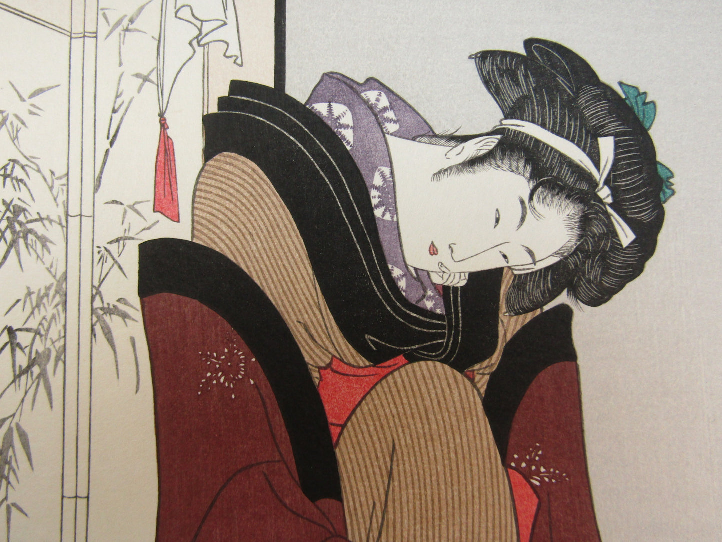 "18-year-old girl, Okita." Utamaro Woodblock print